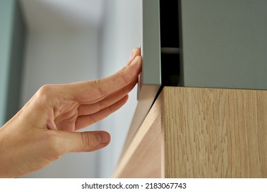 Female Hand Open Kitchen Cabinet, Cupboard Door In Kitchen Furniture