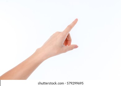 Female Hand Outstretched To The Side And Pointing Finger Isolated On White Background