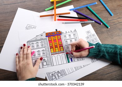 Female hand painting anti stress colouring with pink felt pen - Powered by Shutterstock