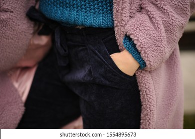 Female Hand In The Pocket Of Purple Corduroy Pants