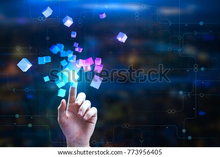 Female hand pointing at abstract glowing cubes on blurry circuit background. Innovation and creativity concept. Double exposure 