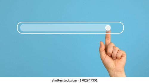 Female hand with a raised forefinger and a virtual loading bar. Abstract future background, close up
