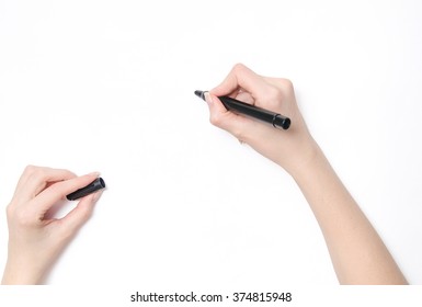 Female hand is ready for drawing with black marker - Powered by Shutterstock