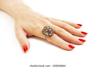 Female Hand With Red Nails With Ring. Isolated On White Background 