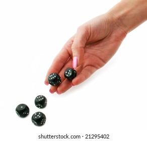 Female Hand Rolling Black Dice Isolated On A White Background