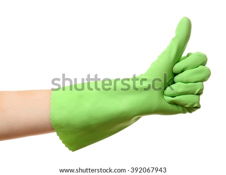 Female hand in rubber glove making thumbs up, isolated on white