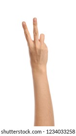 Female hand showing two fingers on white background - Shutterstock ID 1234033258