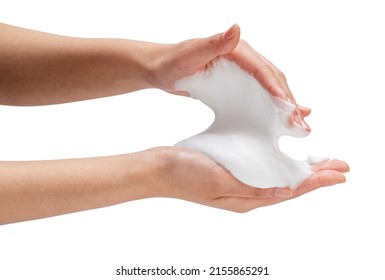 Female Hand With Soap Bubbles On White Background. Hands With White Bubbles. Texture Of White Soap Foam On Female Hand.