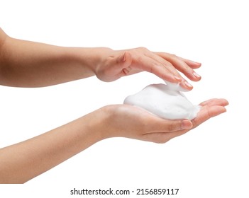 Female Hand With Soap Bubbles On White Background. Hands With White Bubbles. Texture Of White Soap Foam On Female Hand.