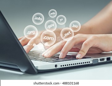 female hand typing on laptop, internet extensions flying 