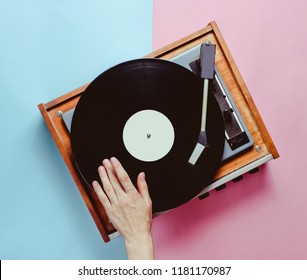 Female Hand Uses Vinyl Player, Conceptual Photo, DJ, Minimalism, Top View
