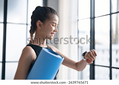 female hand using smartwatch checking health apps