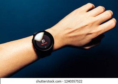 Female Hand Wearing A Smart Watch Measuring Hart Rate