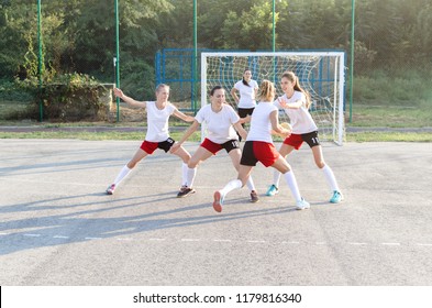 Female Handball Players Are Playing Game Outside.