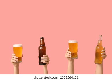 Female hands with bottles and pints of fresh beer on pink background - Powered by Shutterstock