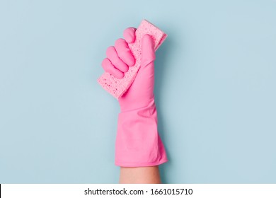 Female hands cleaning on blue background. Cleaning or housekeeping concept background. Copy space.  Flat lay, Top view. - Powered by Shutterstock