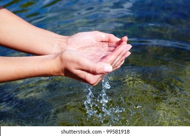 Female Hands With Clear Fresh Water