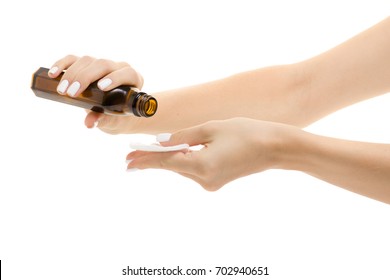 Female Hands With A Cotton Disc And Tonic Medical Alcohol On A White Background Isolation