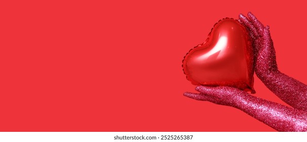 Female hands covered with glitters and heart-shaped balloon on red background with space for text. Valentines Day celebration - Powered by Shutterstock