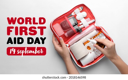 Female hands with first aid kit on white background - Shutterstock ID 2018146598