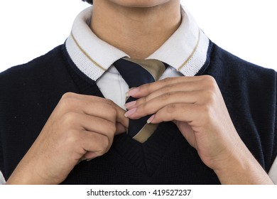 female hands fixing tie