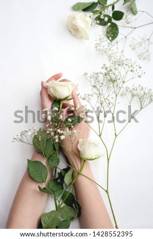 Similar – Hände einer Frau mit Blumenstrauß