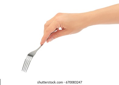 Female hands hold a fork. Isolated on white background - Shutterstock ID 670083247