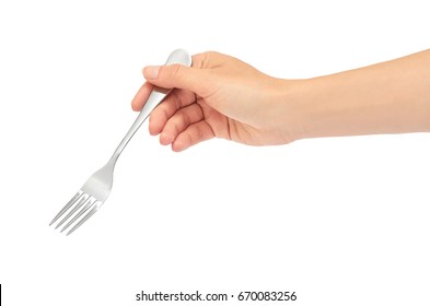 Female hands hold a fork. Isolated on white background - Shutterstock ID 670083256
