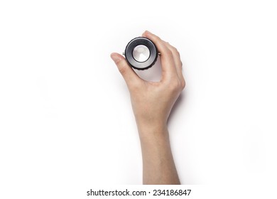 A Female Hands Hold A Magnifier(lupe) For Photo Film Isolated White, Top View At The Studio.