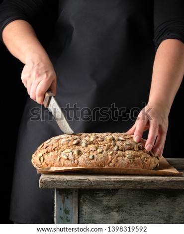 Similar – Image, Stock Photo baked oval rye bread Bread