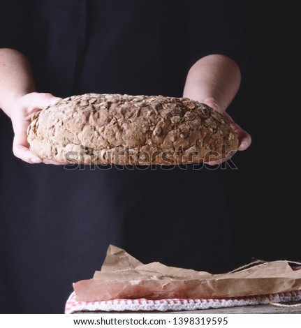 Similar – Image, Stock Photo baked oval rye bread Bread