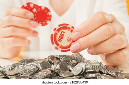 Female Hands Hold A Poker Chip. A Poker Chip With The Number One Thousand And An Empty Space For Inscriptions In Female Hands Close-up Isolated