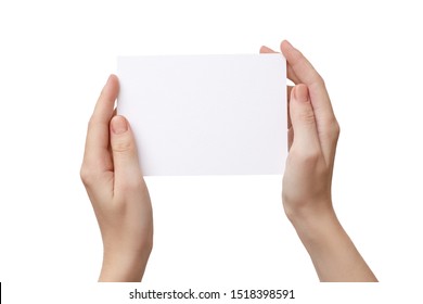 Female Hands Holding Blank Paper Postcard Isolated On White