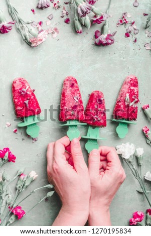 Similar – Image, Stock Photo Red fruit ice cream on a stick