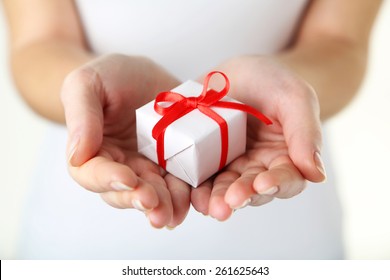 Female Hands Holding Gift Box 