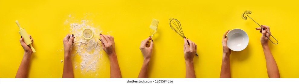 Female hands holding kitchen tools, sieve, rolling pin, bowl, sieve, brush, whisk, spatula for baking and cooking over yellow background. Food frame, bake concept with copy space. - Powered by Shutterstock