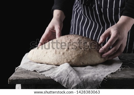 Similar – Image, Stock Photo baked oval rye bread Bread