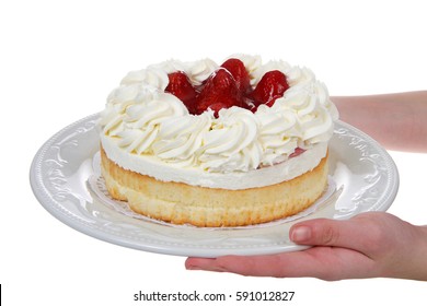 Female Hands Holding Porcelain Plate With Large Strawberry Shortcake Dessert Isolated On White Background