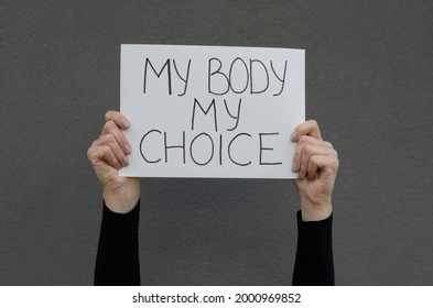 Female Hands Holding A Protest A Sign Reading My Body My Choice Female Right On Legal Abortion. Human Rights Freedom