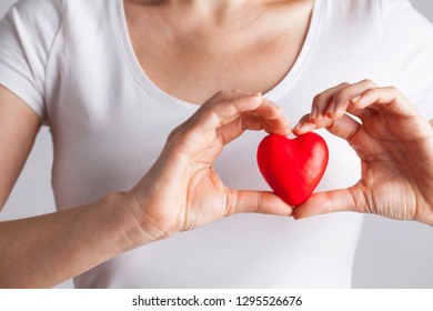 Female hands holding red heart, Love concept for valentines day with sweet and romantic moment