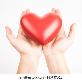 Female Hands Holding Red Heart