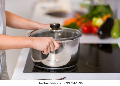 Female Hands Holding Saucepan, Cooking 