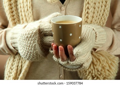 Female hands with hot drink, close-up - Shutterstock ID 159037784