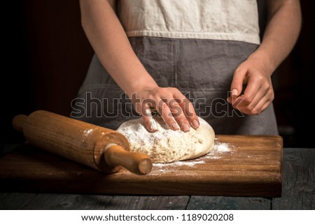 Similar – Foto Bild Frau beim Kneten von handwerklichem Brot auf Holztisch