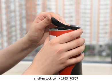 Female Hands Opening The Lid Of A Food Jar