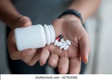 Female Hands with Prescription Drugs, Patient hands on Medication prescribed by Doctor.