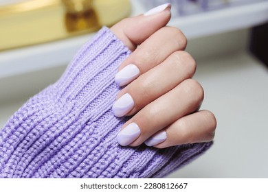 Female hands and purple colour nails close  up  Nail design  Artistic manicure and purple nail polish