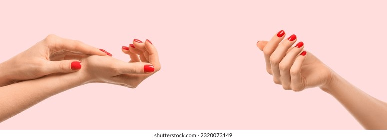 Female hands with red manicure on light pink background. Banner for design - Powered by Shutterstock