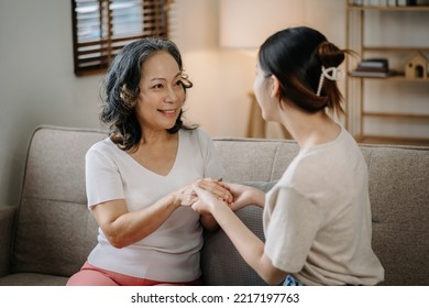  Female Hands Touching Old Female Hand Helping Hands Take Care Of The Elderly Concept
