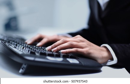 Female Hands Typing On Computer Keyboard